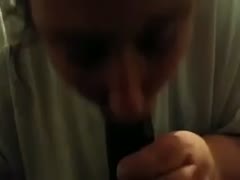My big black dick is being blown by a gorgeous white floozie.